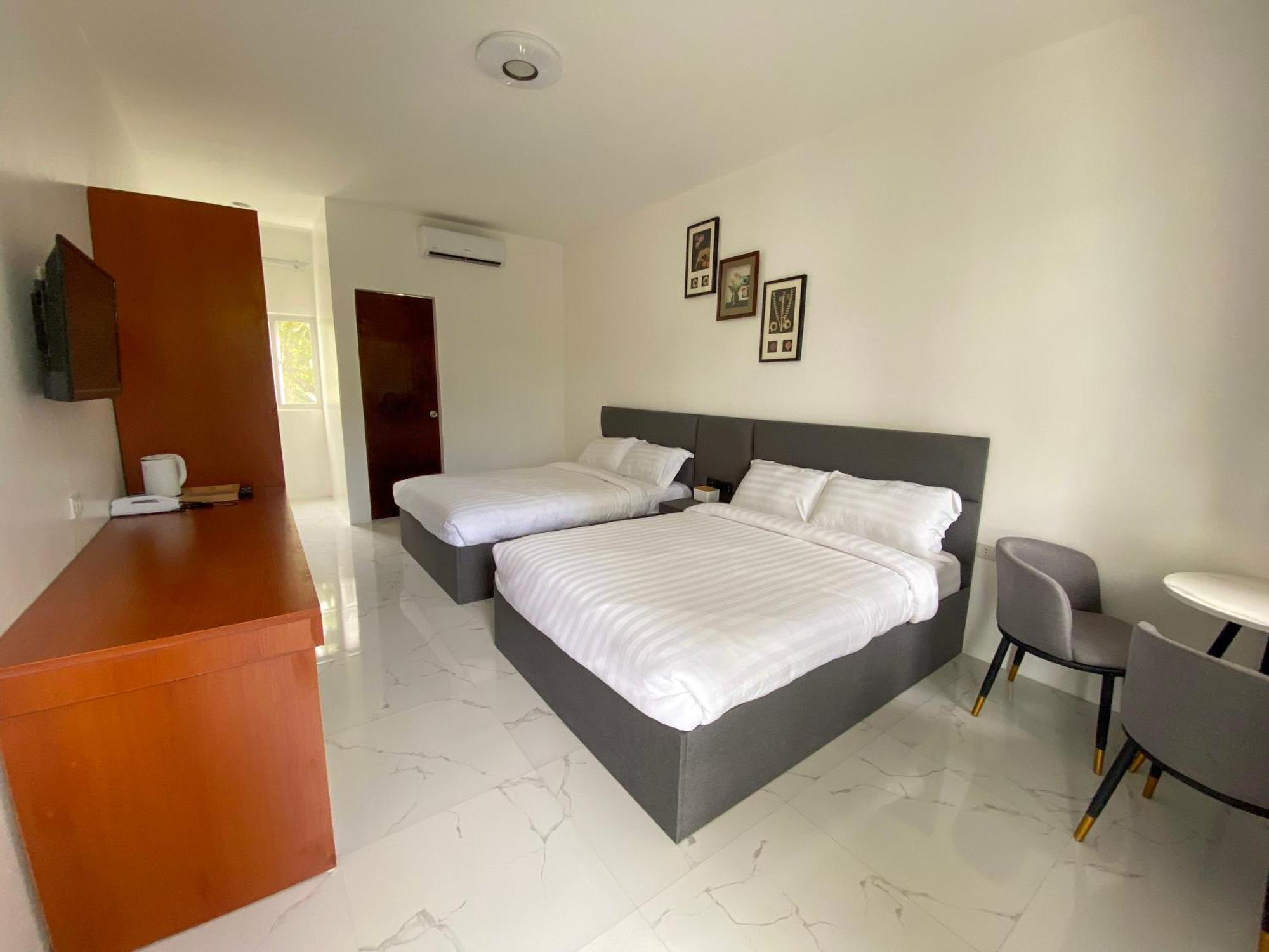 Q Beach Resort Cabangan Habitación foto