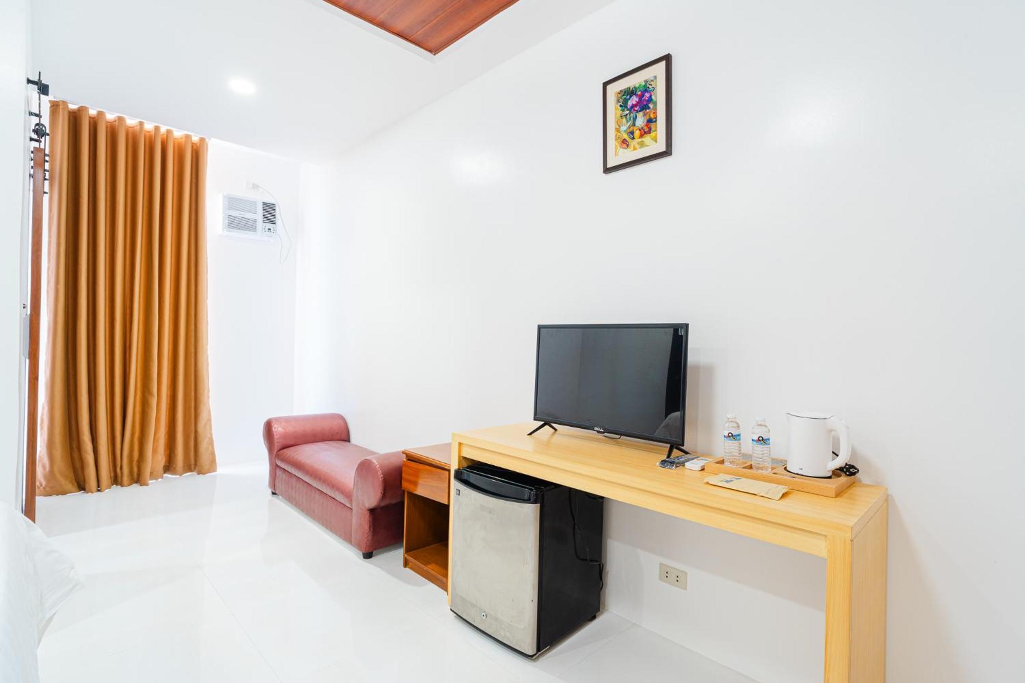 Q Beach Resort Cabangan Habitación foto